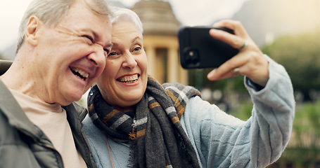 Image showing Selfie, smile and senior couple in a park, happy and laugh, relax and bond in nature on the weekend. Love, fun and elderly man and woman relax outdoor with profile picture while enjoying retirement