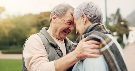 Image showing Kiss, forehead and senior couple in a park with love, happy and conversation with romantic bonding. Kissing, old people and elderly man embrace woman with care, romance or soulmate connection outdoor