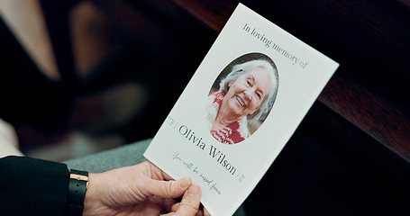 Image showing Funeral, photo and senior woman death in church with respect and farewell memorial. Goodbye, hands and chapel with sadness and mourning of grandmother with information and picture of elderly person