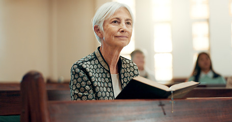 Image showing Bible, religion and a senior woman in a church for a sermon on faith or christian belief while sitting in a pew. Prayer, worship or reading with an elderly female person hearing about God and Jesus