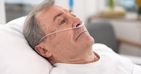 Image showing Oxygen, hospital bed and senior man with ventilation and breathing tube support in a clinic. Elderly patient, medical care and emergency room with male person at a doctor for wellness and healthcare