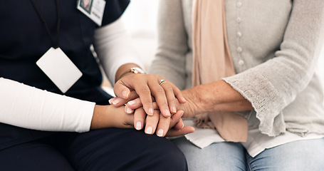 Image showing Senior person, holding hands and caregiver empathy, support and elderly care for client with medical problem. Retirement home, wellness and closeup clinic therapist, surgeon or nurse with kindness