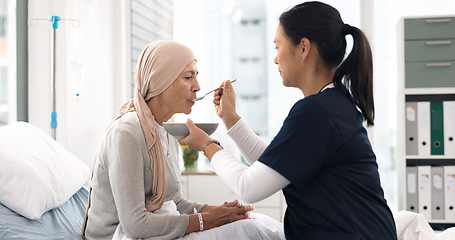 Image showing Cancer, nurse and help with old woman in hospital for food, medical and support. Healthcare, medicine and rehabilitation with senior patient and caregiver in clinic for nursing, empathy and oncology