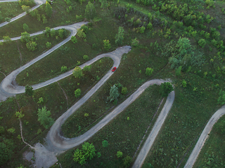 Image showing Aerial top vew of winding road in the city