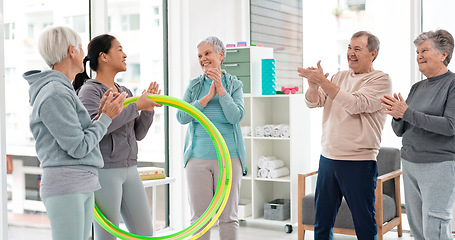 Image showing Fitness, senior and people with celebration at gym at end or exercise class for wellness. Elderly, group and friends in studio to congratulation after workout in retirement with coach and hula hoop.