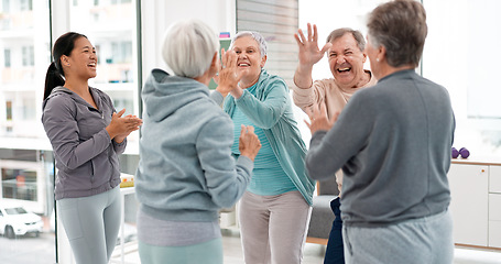 Image showing Fitness, hands together and senior people for exercise support, celebration and teamwork in workout class. Exercise, training goal and group of elderly man and women with high five for health success