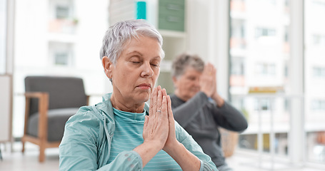 Image showing Senior people, yoga class and coach meditation, prayer and peace hands for exercise, holistic wellness and mindfulness. Spiritual workout, group and calm elderly women, clients and personal trainer