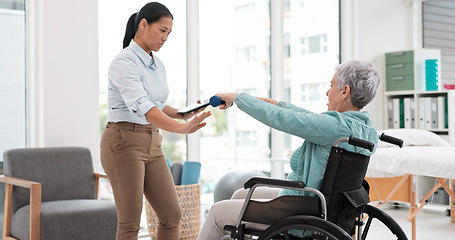 Image showing Woman with disability, physiotherapy and dumbbell exercise for healthcare assessment, test or digital checklist of medical progress. Physiotherapist, tablet or consulting senior patient in wheelchair