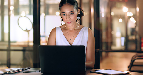 Image showing Business woman with technology, typing and working night to meet deadline, kpi target and overtime with laptop and tablet. Black woman, corporate workplace and focus, schedule and overtime at office.