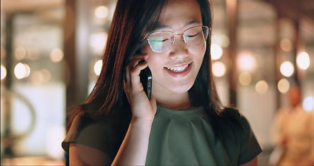 Image showing Business woman, phone call and communication, networking and work late with b2b and office in Shanghai. Virtual discussion, Asian employee and network with phone, connection on call and technology