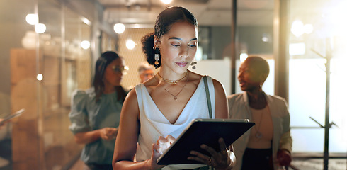 Image showing Tablet, team and black woman in office walking to business meeting doing research, online and using internet. Teamwork, leadership and group of busy female workers together in corporate workplace