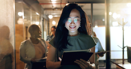 Image showing Night, tablet and business people walking in office after finishing work task. Tech, overtime and Asian woman with group of friends going home after working late on sales project in dark workplace.