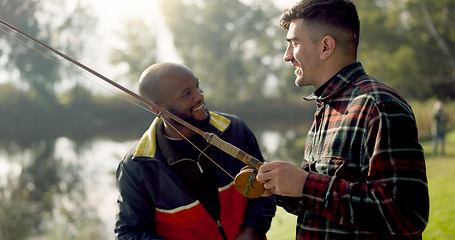 Image showing Fishing, lake and friends in nature talking on holiday, adventure and vacation together outdoors. Friendship, conversation and men with rods by river for sports hobby, activity and catching fish