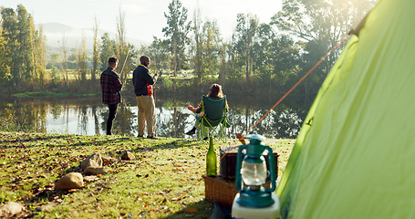 Image showing Fishing, camping and friends by lake in nature on holiday, adventure and vacation together outdoors. Campsite, relax and men and woman with rod by river for sports hobby, activity and catch fish