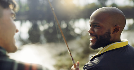 Image showing Fishing, laugh and friends in nature talking on holiday, adventure and vacation together outdoors. Friendship, lake and men in conversation with rod by river for sports hobby, activity and catch fish