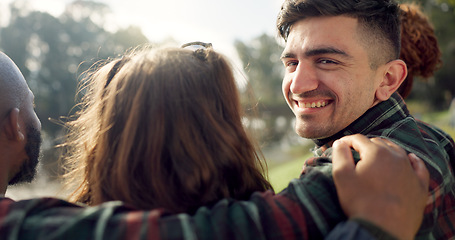 Image showing Happy, face and man with friends on lake, camping in nature or group laughing and bonding on outdoor picnic at the park. Portrait, person or smile in conversation, social gathering or relax in woods