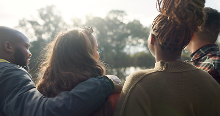 Image showing Happy, face and woman with friends on lake, camping in nature or group laughing and bonding on outdoor picnic at the park. Portrait, smile and girl relax in conversation or social gathering in woods