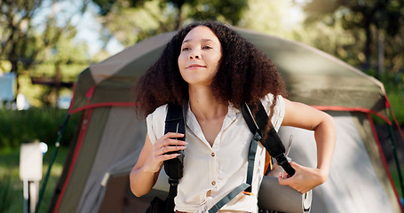 Image showing Camping, smile and a woman with a backpack in nature for hiking, trekking or adventure in the morning. Happy, ideas and a young girl with a bag for a journey, walk or vacation in the mountains