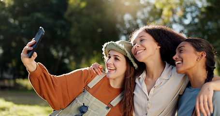 Image showing Friends, camping and selfie, women in nature for summer vacation together with smile and trees. Relax, happy woman and girls taking picture in forest on camp holiday, friendship and fun outdoor time.