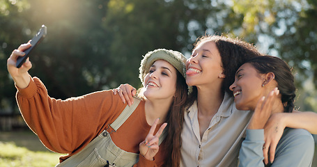 Image showing Friends, camping and selfie, women in nature for summer vacation together with smile and trees. Relax, happy woman and girls taking picture in forest on camp holiday, friendship and fun outdoor time.