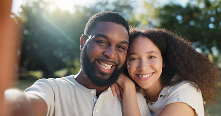 Image showing Love, selfie and face of a couple in nature on a romantic date in a garden while on a holiday. Happy, smile and portrait of African young man and woman taking picture together in park on weekend trip