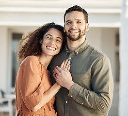 Image showing Couple, hug and happiness outdoor in portrait, love and care with bonding, support and trust in a marriage. Life partner, laughing together and holding hands, people at home with respect and romance