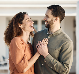 Image showing Couple, hug and happiness outdoor, love and care with bonding, support and trust in a marriage. Life partner, laughing together and holding hands, people at holiday home with respect and romance