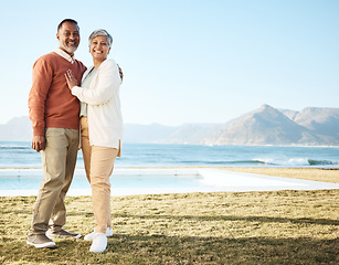 Image showing Beach, mockup and happy senior couple on vacation or holiday together with love in nature at the sea or ocean. Elderly, man and portrait of woman relax with happiness, care on retirement bonding