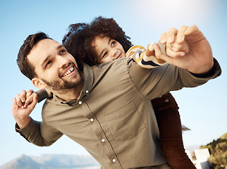 Image showing Father, child and piggyback, hug and happiness outdoor with bonding, fun and games together. Man, young girl and playing, summer and smile with care, love and support with parenting and childhood