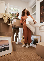 Image showing Real estate, success and couple smile in a living room for moving, dream and home, relocation or mortgage. Property, investment and happy man with woman in new house with box, furniture and excited