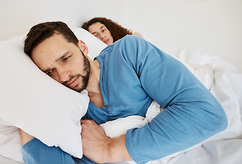 Image showing Divorce, fight and angry couple in bed after fight, discussion or frustrated by cheating wife at home. Bedroom, problem and man ignore annoyed woman with depression, anxiety or erectile dysfunction