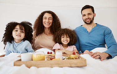 Image showing Happy children, parents or portrait of breakfast in bed, food and enjoy quality time together, comfort and stress relief. Happiness, family home apartment or bedroom kids, mom and dad relax with meal