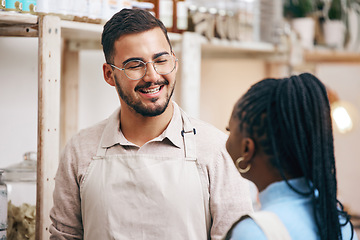 Image showing Shopping, grocery store and man with customer for help, assistance and service in eco friendly market. Small business, sustainable shop and manager with black woman for groceries, products and food