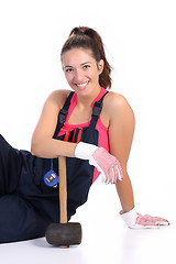 Image showing woman with black rubber mallet 