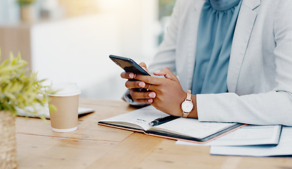 Image showing Black woman, hands and phone chatting in business for communication, social media or texting on office desk. Hand of African American female typing on smartphone or mobile app for research or chat