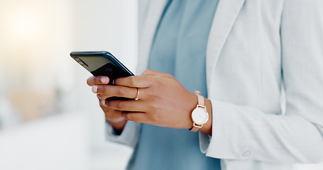 Image showing Black woman, hands and phone texting in business for communication, social media or chatting at the office. Hand of African American female typing on smartphone or mobile app for research or chat