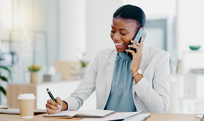 Image showing Black woman, phone call and writing in book consulting for financial advice, conversation or communication at office. Happy African female accountant talking on smartphone checking data on computer