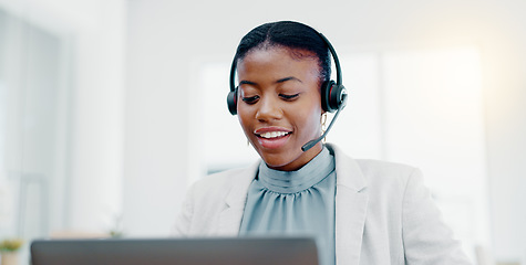 Image showing Black woman, call center and consulting on laptop for telemarketing, customer service or desktop support. Friendly African female consultant talking on headset for help, advice or communication