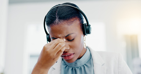 Image showing Black woman, call center and headache in stress, burnout or anxiety from strain at the office. African American female consultant suffering head pain, ache or sore eyes feeling overworked or stressed