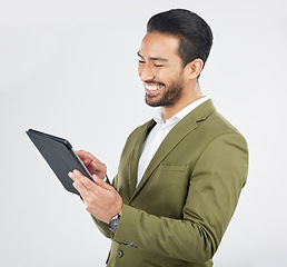 Image showing Smile, tablet and happy businessman search internet on technology isolated in a studio white background. Online, planning and young person or employee working on connection or networking on app