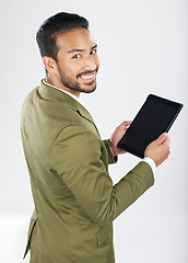 Image showing Smile, tablet and portrait of businessman with technology with internet isolated in a studio white background. Online, planning and young person or employee working on connection or networking