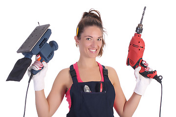 Image showing Beauty woman with auger and sander 