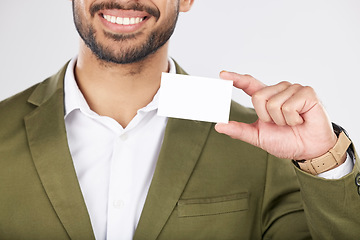 Image showing Happy man, hand and business card in advertising, marketing or branding against a white studio background. Closeup of businessman with paper or poster for contact information or services on mockup