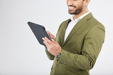 Image showing Smile, tablet and businessman search internet with technology with isolated in a studio white background. Online, planning and young person or employee working on connection or networking with app