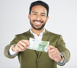 Image showing Happy asian man, portrait and money in finance, savings or investment loan against a white studio background. Businessman smile with cash, euro or bill in financial freedom, profit or salary increase