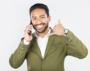 Image showing Phone call, hand gesture and portrait of business man in studio for conversation, chat and communication. Networking, shaka sign and professional person on smartphone for deal on white background