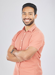 Image showing Business, crossed arms and portrait of Asian man in studio smile for career, work and job opportunity. Confidence, professional male and isolated happy person in casual style on white background