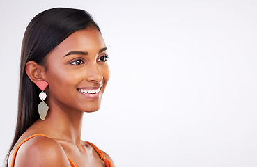 Image showing Face, beauty and Indian woman in studio for makeup, glamour and natural cosmetics on white background. Smile, glowing skin and female model with confidence, shine and pose with body care satisfaction