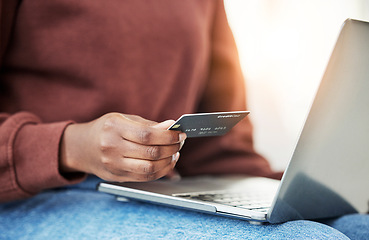 Image showing Closeup, woman and hand with a laptop, credit card or online shopping with banking, investment or transaction. Person, customer or girl with a pc, payment or ecommerce with fintech or budget planning