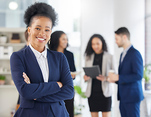 Image showing Crossed arms, confidence and portrait of professional black woman in the office with a smile. Happy, career and young African female attorney with pride standing by a legal team in the workplace.